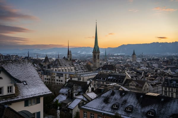 The Zurich skyline at dusk.