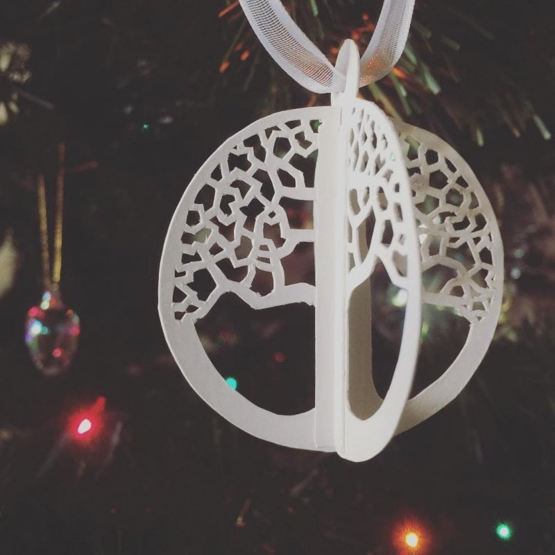 Homemade papercut Christmas tree decorations by @banjahanja from a few years ago.