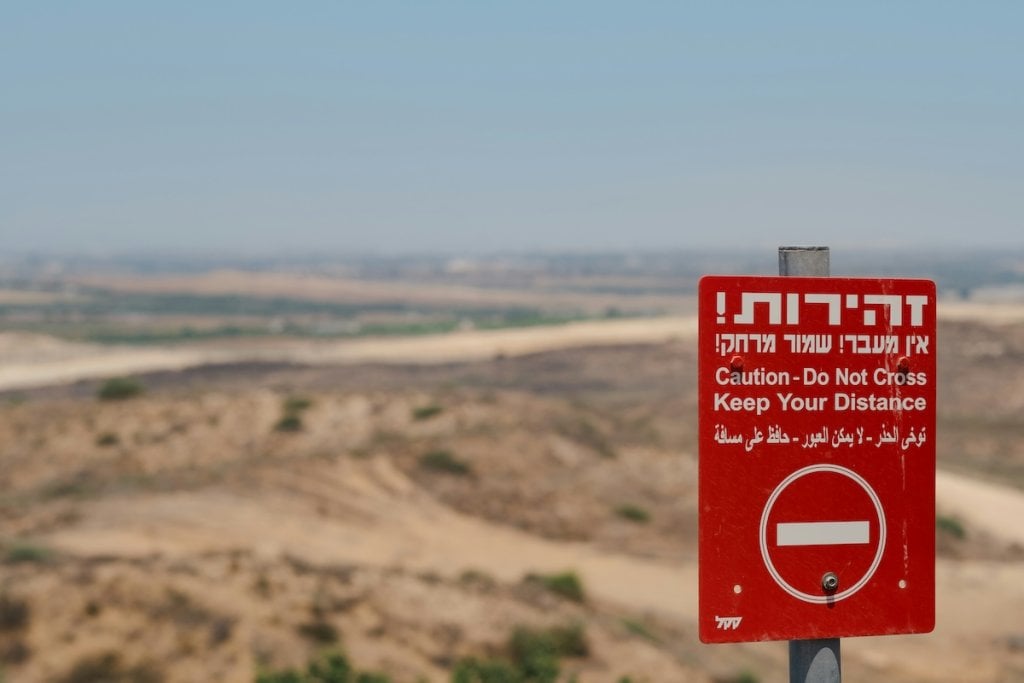 A warning sign looking out over the Gaza strip