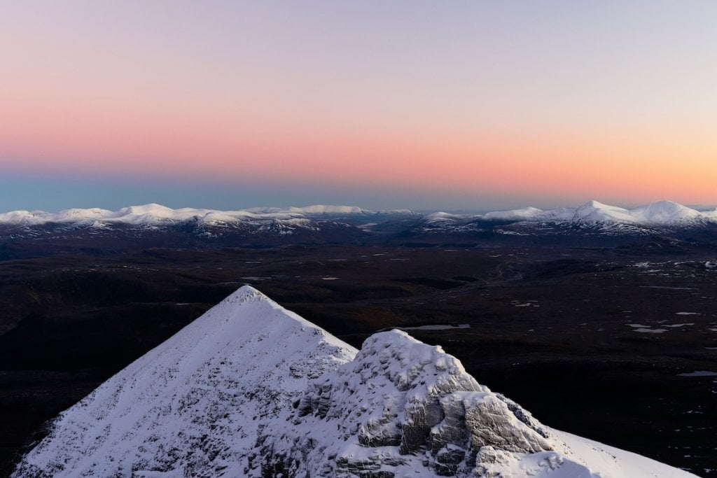 Mountains on the horizon, via Unsplash+